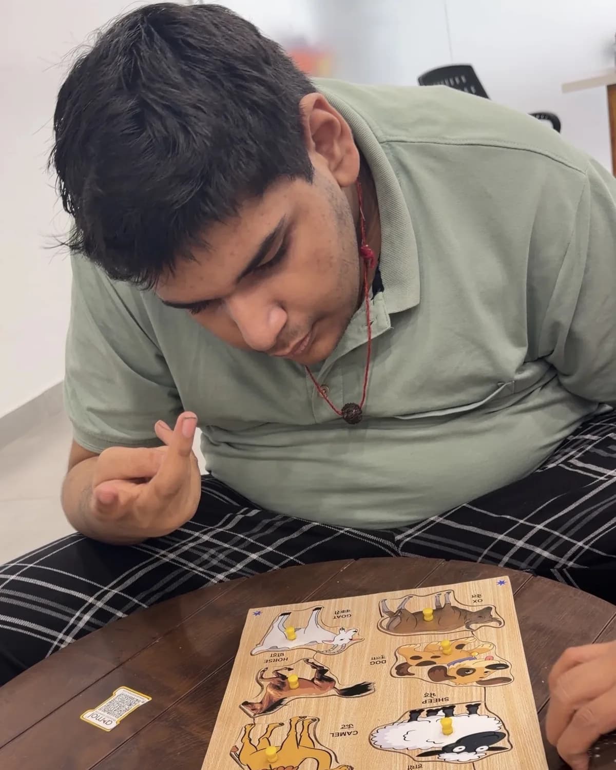 A young person completing a structured puzzle task
